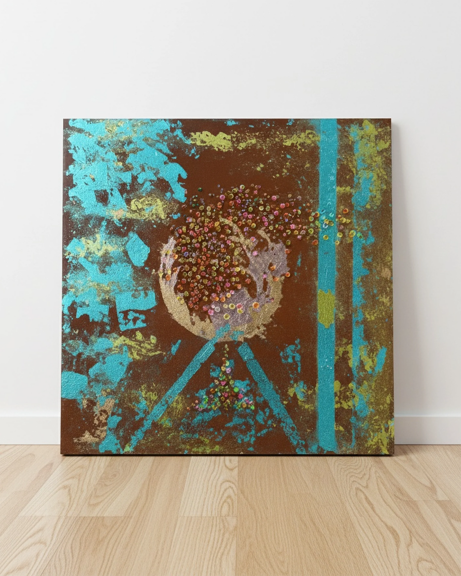 Abstract resin wall art with blue, green, and gold leaf textures and colorful epoxy resin dots